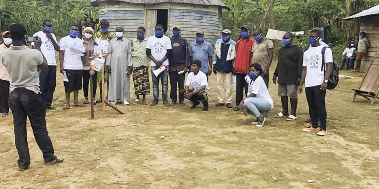 After installation of tippy tap and sensitization with ( photo with chief of Nkikok village)